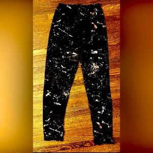 Womens black neon paint spatter leggings .  OS. Great condition.